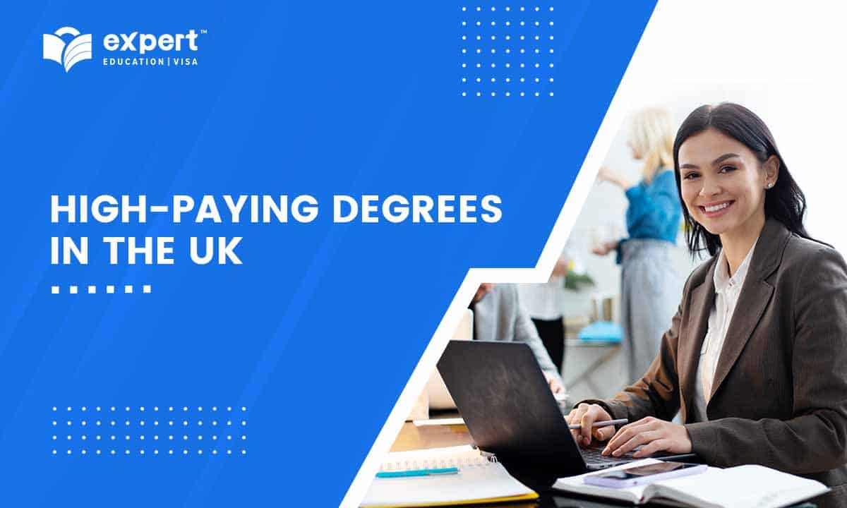 Young business woman working on laptop at office