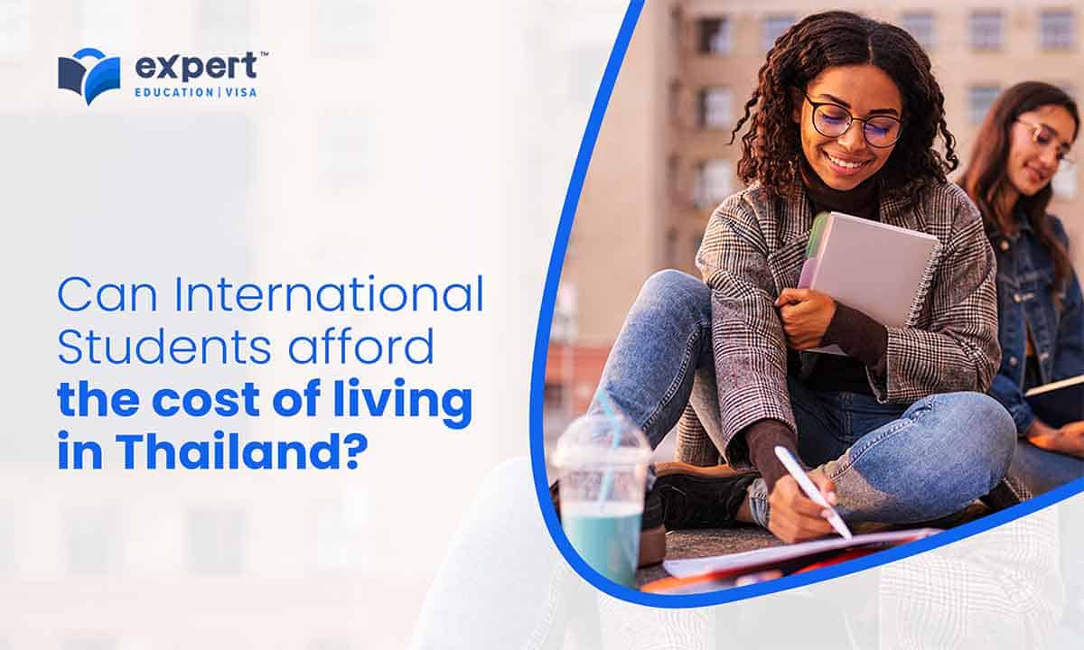 smiling student writing on note at university campus